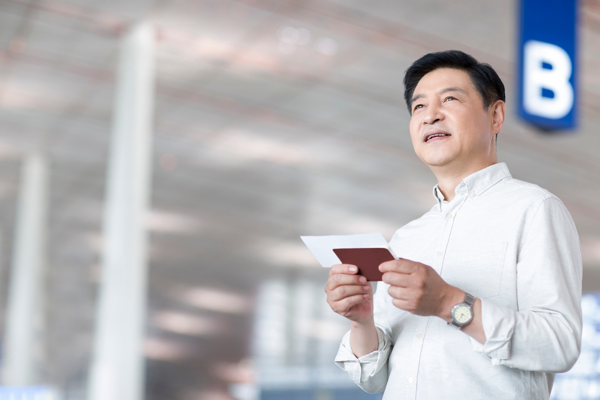 Mature man waiting at airport
